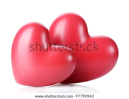two decorative red hearts isolated on white