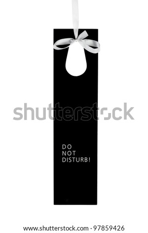 Do not disturb hotel door label on ribbon with text isolated on white