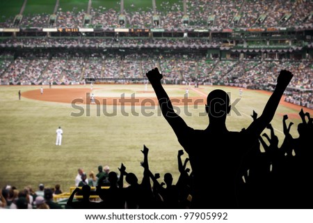 Fan celebrating a victory at a championship baseball game. Royalty-Free Stock Photo #97905992
