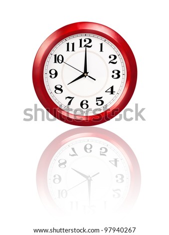 red wall clock with reflection