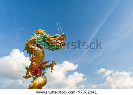  dragon sculpture on blue sky background