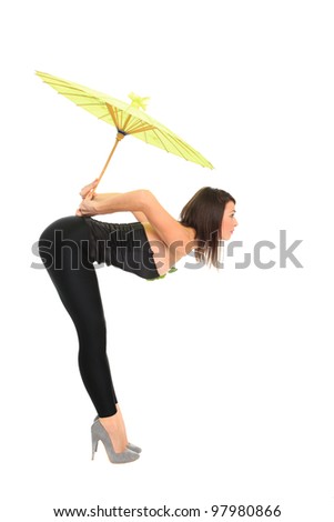 Young women holding a green umbrella isolated