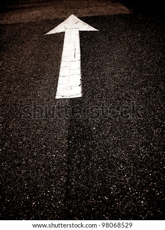        an image of an arrow on the road
