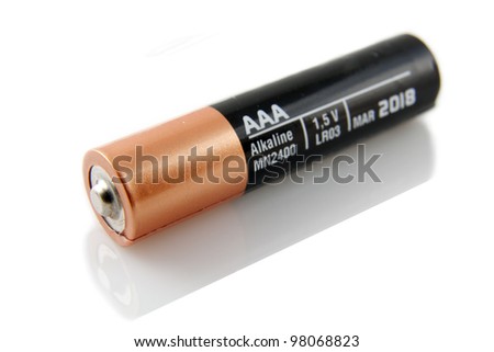 AAA battery against white. Royalty-Free Stock Photo #98068823