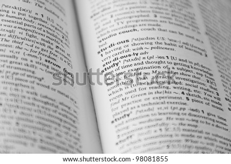 Dictionary page with word "study" in focus and other is defocused Royalty-Free Stock Photo #98081855