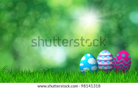 Colorful easter eggs in the green grass