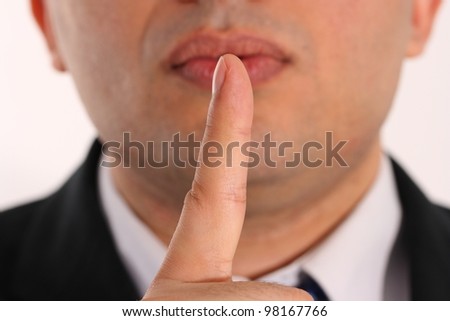 please be silence, hand and mouth expressions of a businessman