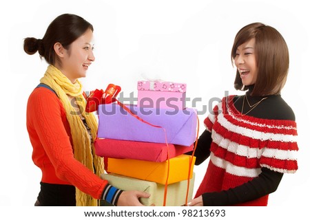 Two girl holding a gift
