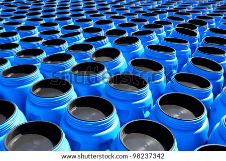 The blue plastic barrels for storage of chemicals Royalty-Free Stock Photo #98237342