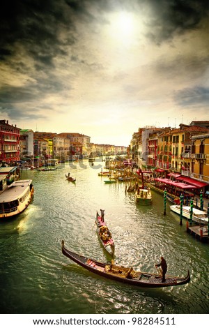 Boats and gondolas on the Grand Canal of Venice, Italy. Royalty-Free Stock Photo #98284511