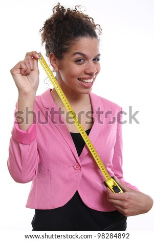 Beautiful woman holding a centimeter ruler