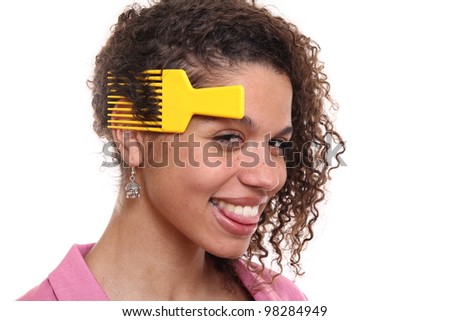 Beautiful woman with a afro comb