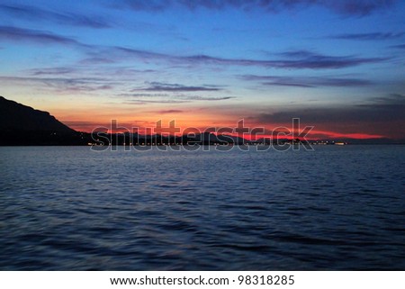 Denia sunset view from sea Mediterranean backlight in Alicante province of Spain