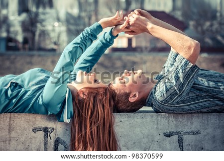 Happy young couple in love Royalty-Free Stock Photo #98370599