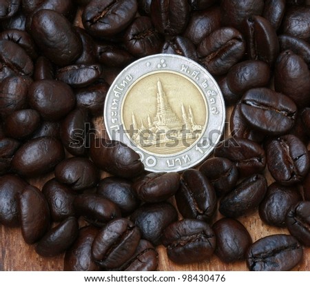 10 baht coin(Thai money) and coffee beans