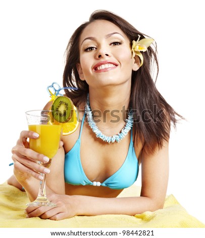 Girl in bikini drink juice through  straw.