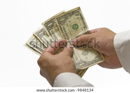 two hands counting money on white backgrund