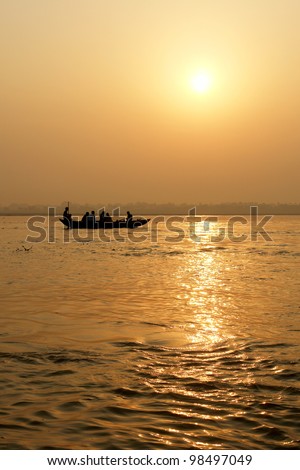 Tradicional boat trip in ganjes river at sunrise, Varanasi, India