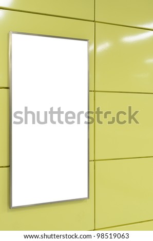 One big vertical / portrait orientation blank billboard on modern yellow wall