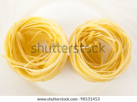 Dry instant noodle on white plate