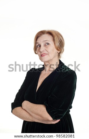 an nice elderly woman in a dress standing on light