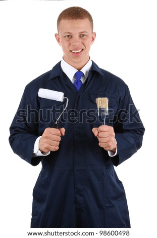 A painter with a roller and a paintbrush, isolated on white
