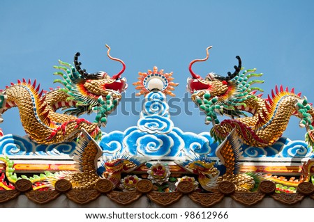 Two dragon with glass beads