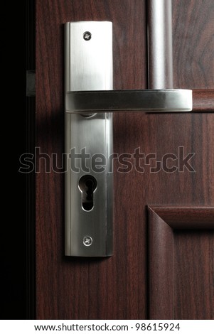 Door handle dark background, nobody, keyhole