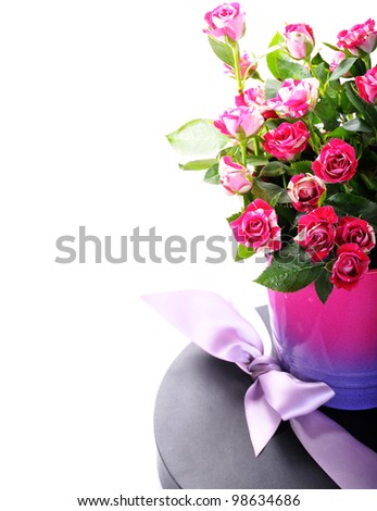 The black gift with pink roses
