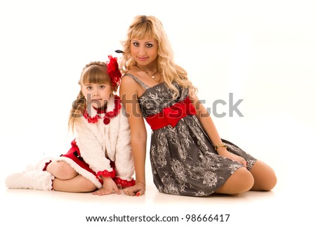 Beautiful young mother and daughter isolated on white background