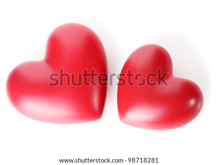 two decorative red hearts isolated on white