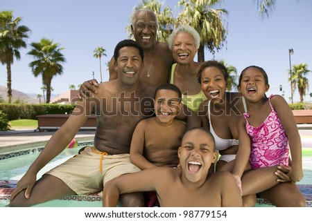 Family Relaxing Poolside