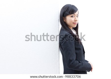 Pretty young woman with a blank presentation board