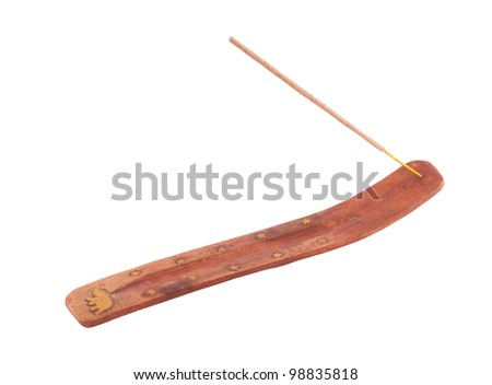 Aromatic stick on a holder from a tree on a white background. Royalty-Free Stock Photo #98835818