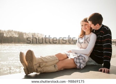 Young happy couple together  - outdoor lifestyle portrait