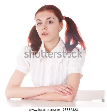 Girl sits in class