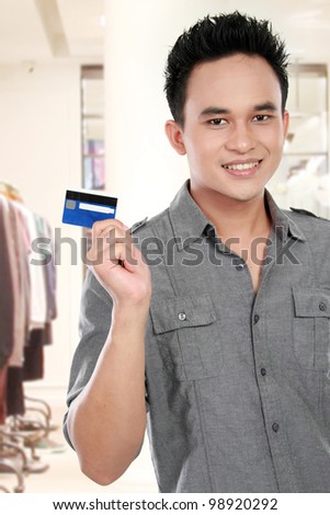 man showing credit card for shopping