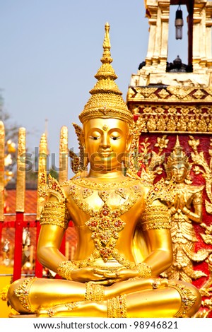 gold buddha statue in thai temple