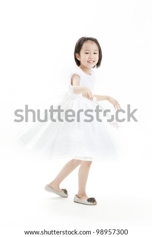 Happy girl portrait playing - isolated over a white background