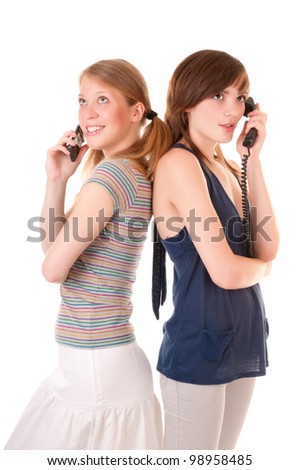 Two friends communicate by phones isolated on white background