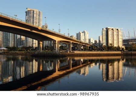 The Cambie Bridge, at sunrise, crosses False Creek into downtown Vancouver. British Columbia, Canada.
