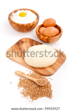 Raw freshyeast dough with eggs,  isolated on white
