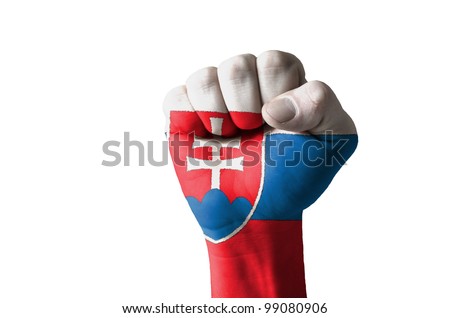 Low key picture of a fist painted in colors of slovakia flag