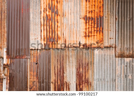 Rusty corrugated metal wall Royalty-Free Stock Photo #99100217