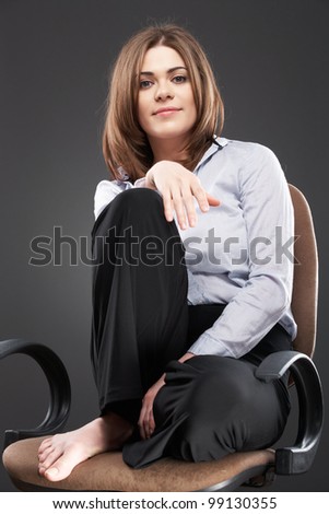 Sitting business woman portrait over gray background isolated