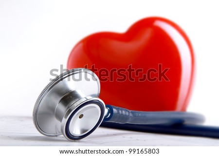 A heart with a stethoscope lying