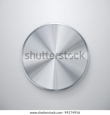 Blank shiny silver knob or push button over brushed metal background