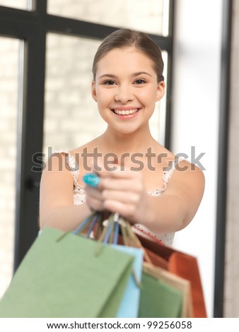 picture of teenage girl with shopping bags