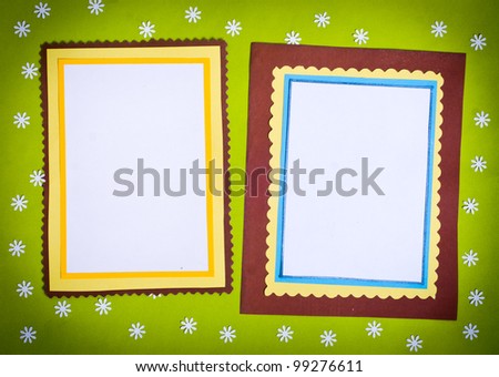 Frame made ??of paper on a green background