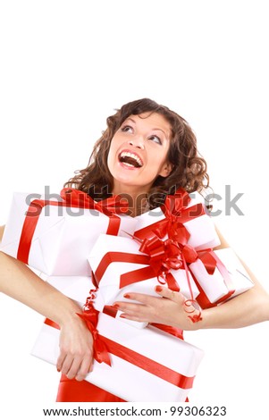 Excited attractive woman with many gift boxes and bags